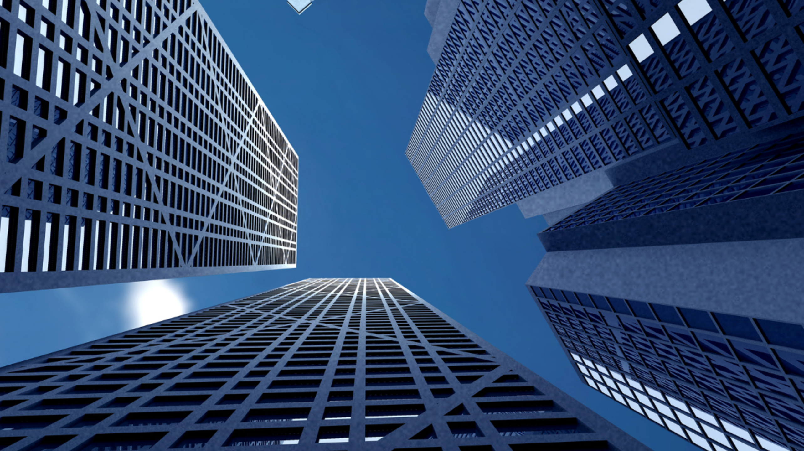 Upward view of skyscrapers with geometric patterns, reflecting a clear blue sky, framed by urban architecture.